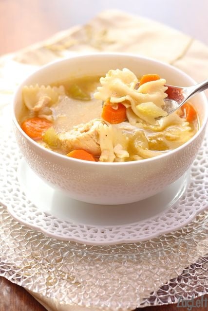 A bowl of chicken noodle soup.