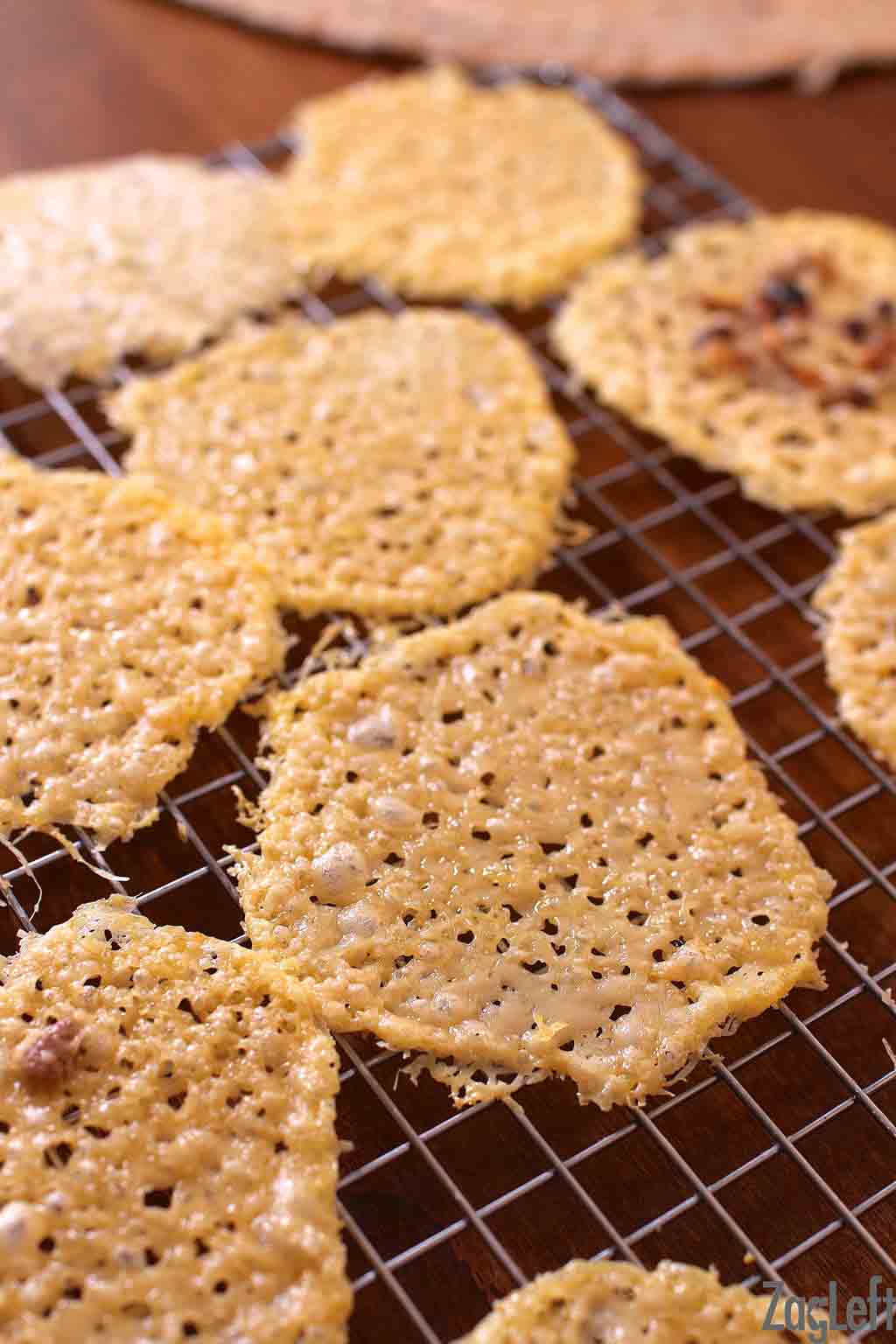 Parmesan cheese crisps on a cooling rack.