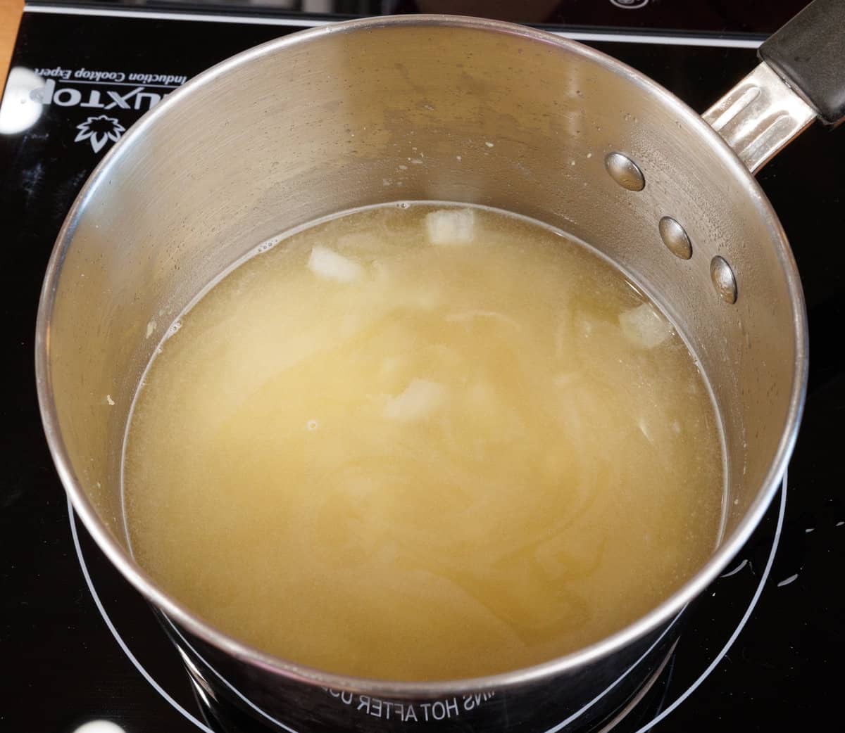 broth simmering in a small pot
