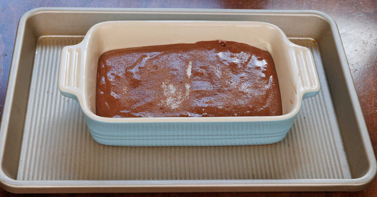 flourless chocolate cake batter in a small baking dish.