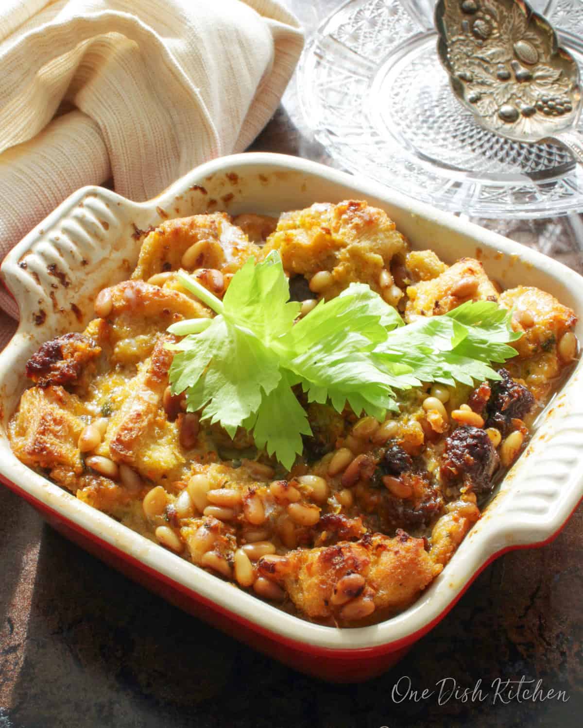 a small batch of sausage stuffing in a baking dish.