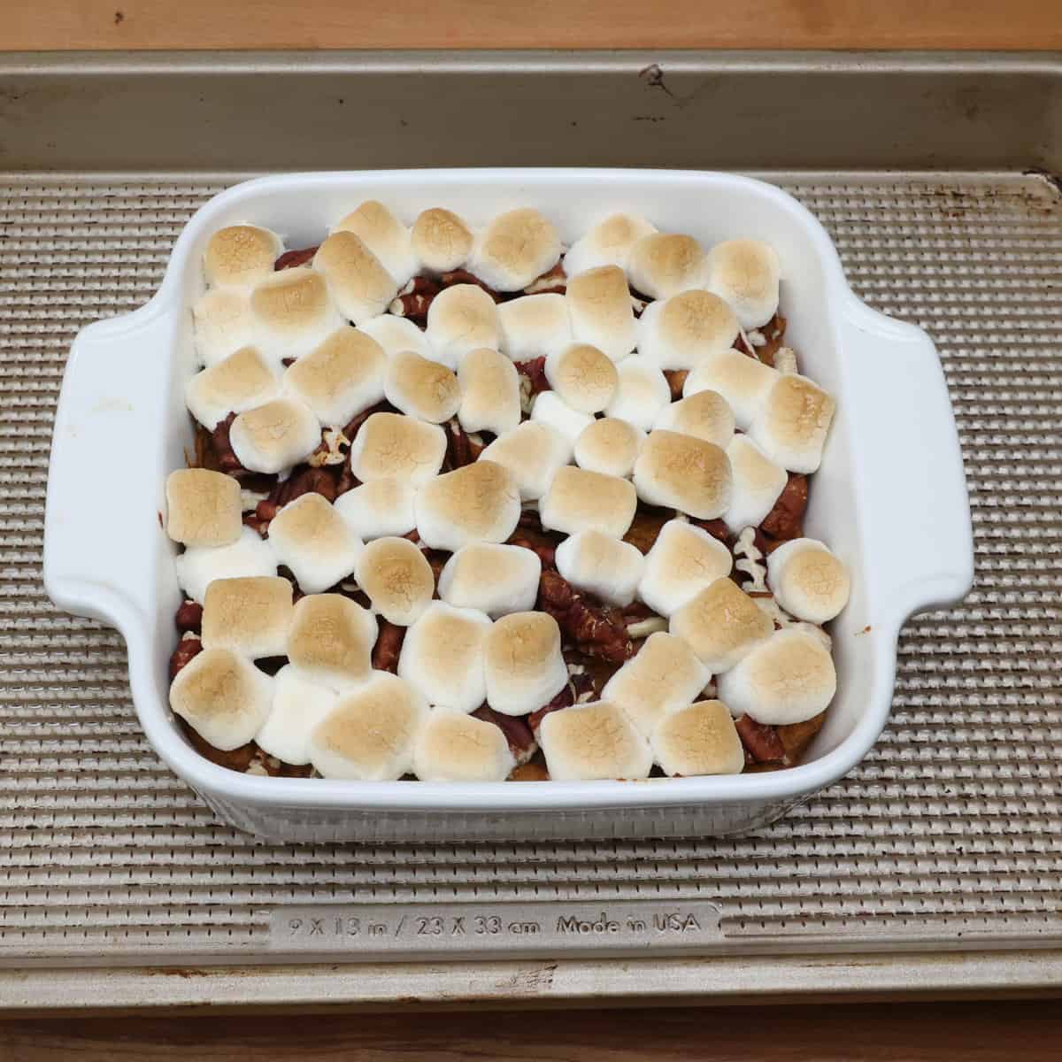a mini sweet potato casserole on a rimmed baking sheet.