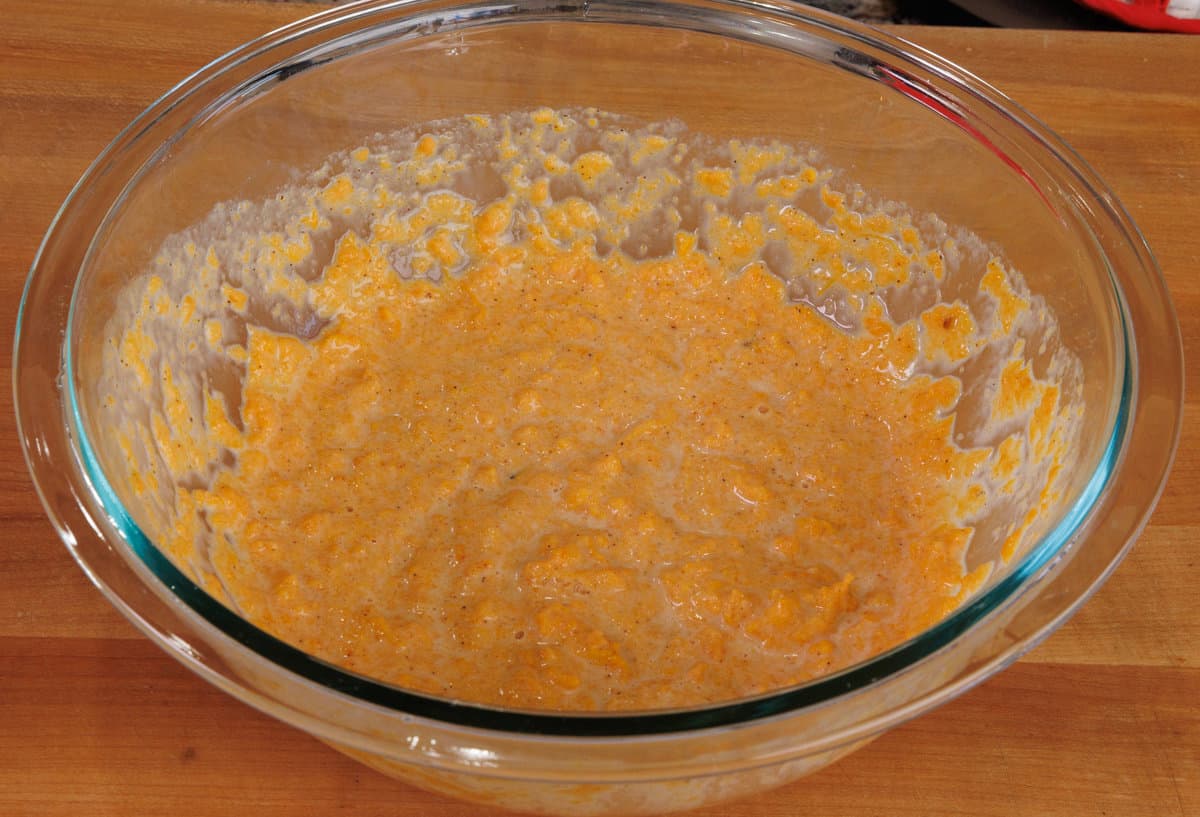 sweet potato pie filling in a mixing bowl.