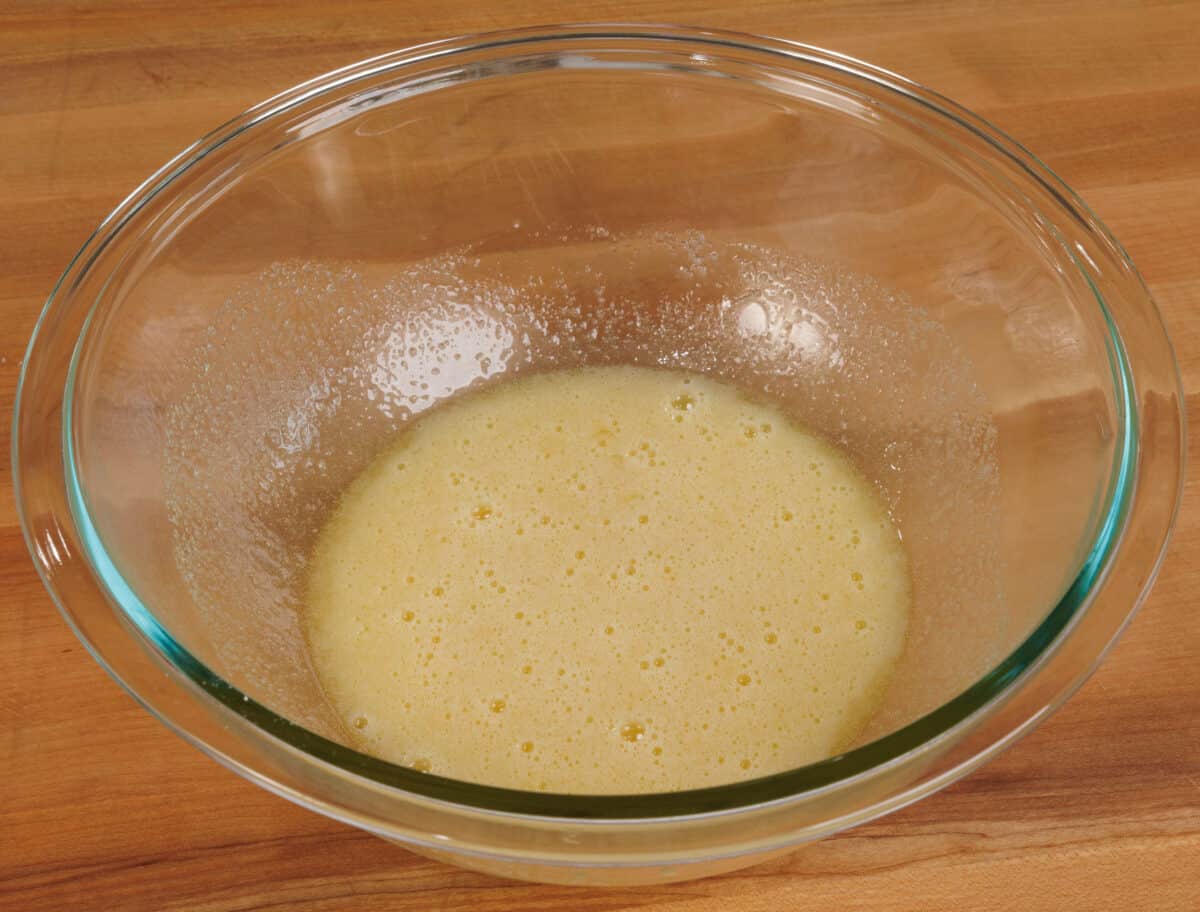 melted butter and sugar in a mixing bowl
