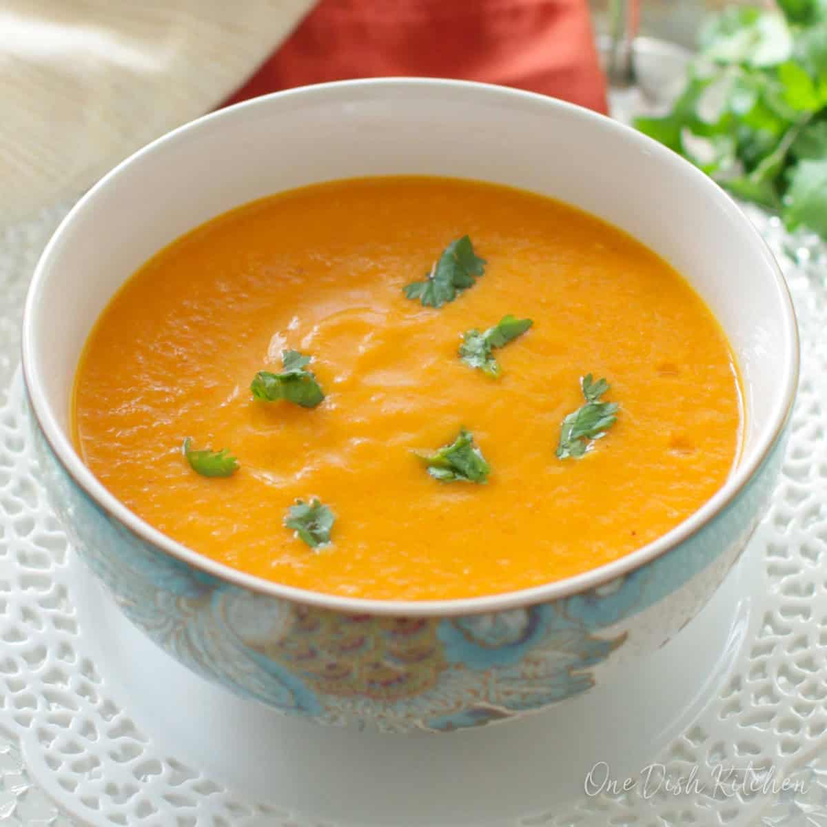 a small bowl of curried carrot soup.