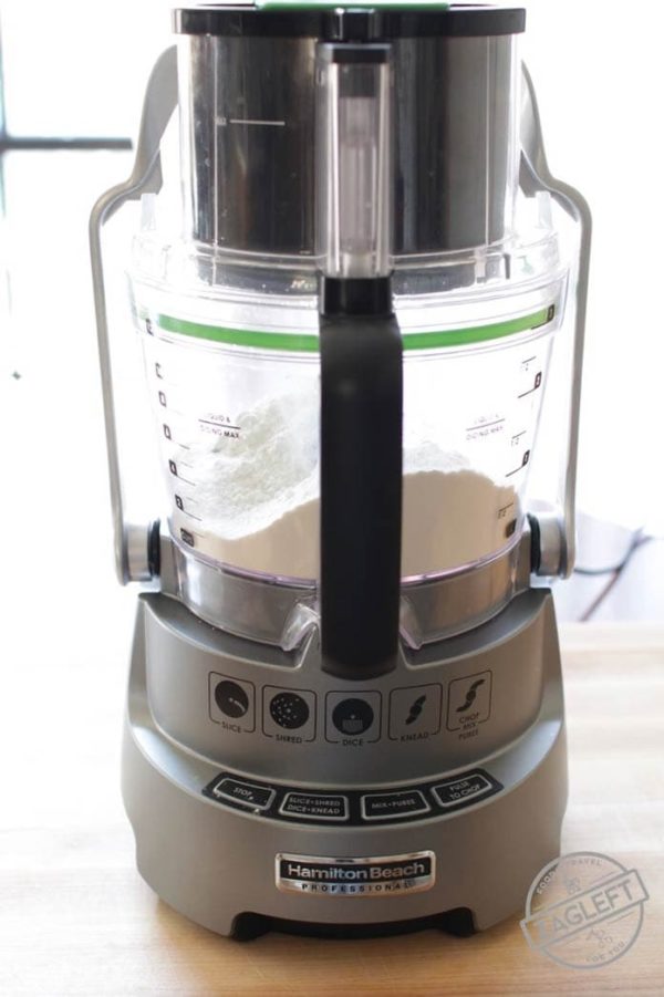food processor on wood counter