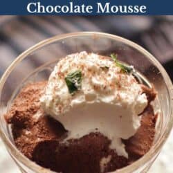 a bowl of chocolate mousse topped with whipped cream.