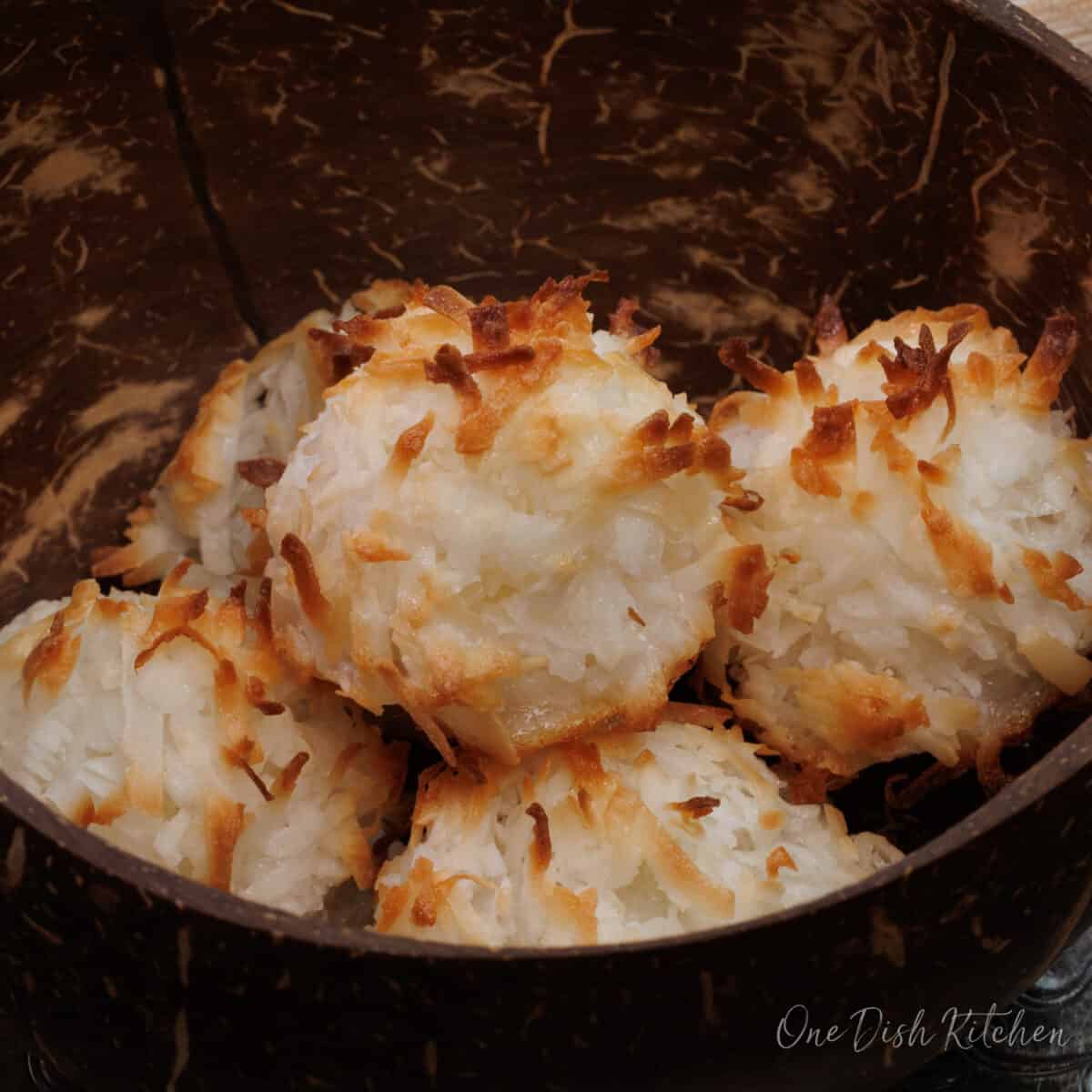 a brown bowl filled with coconut macaroons