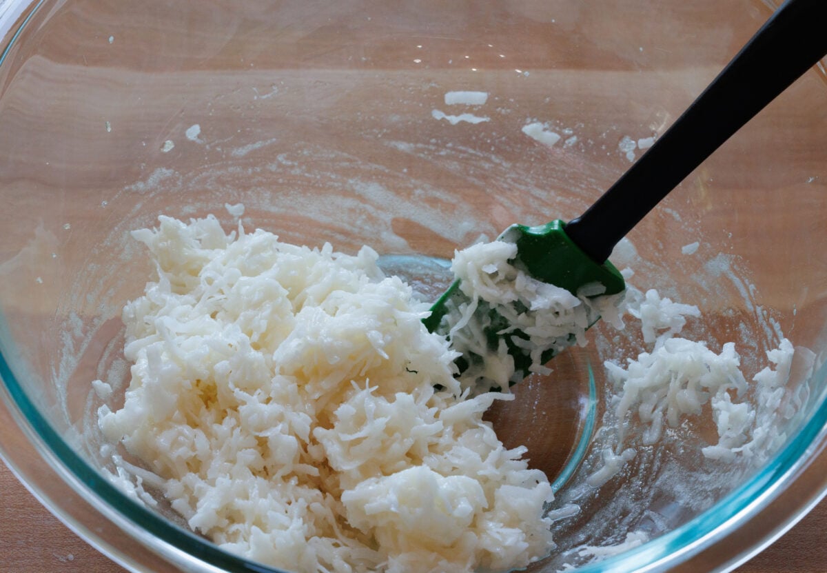 coconut mixed into egg whites for coconut macaroons