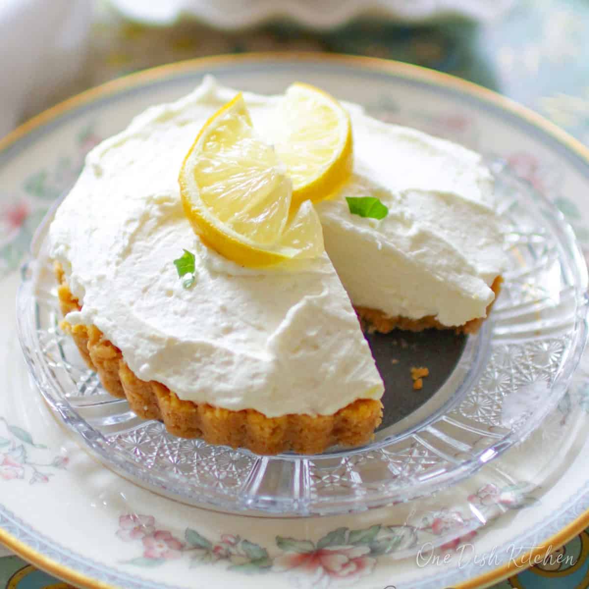 a small lemon cheesecake mousse on a plate.