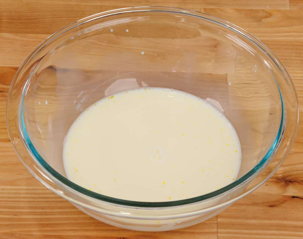 a cornstarch slurry for butterscotch pudding in a mixing bowl