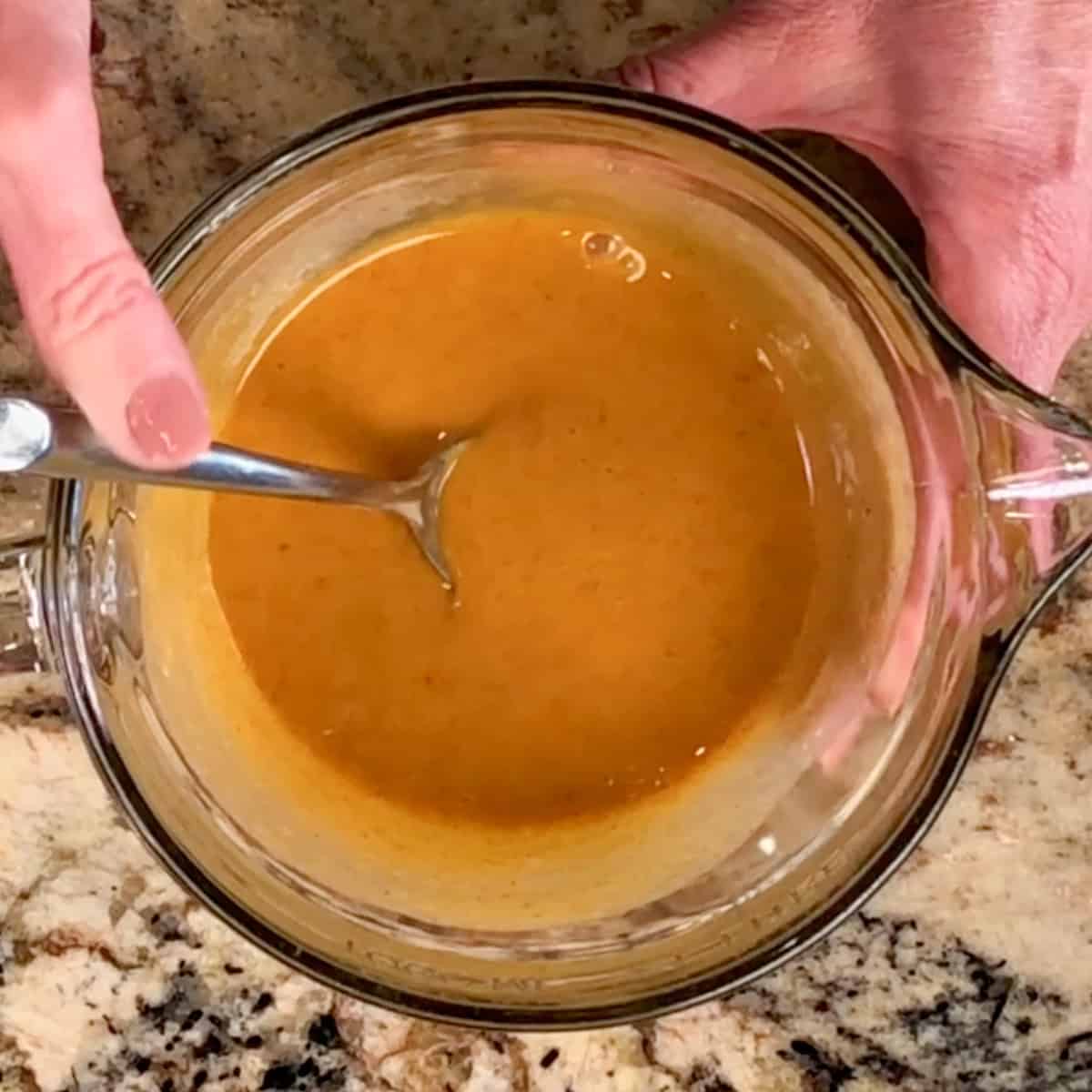 pumpkin pie filling in a mixing bowl.