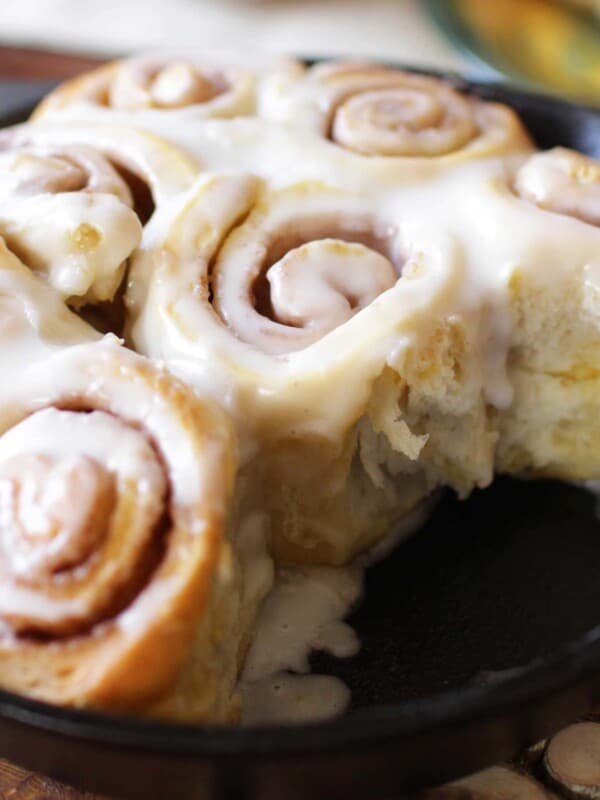 a small cast iron skillet filled with homemade cinnamon rolls