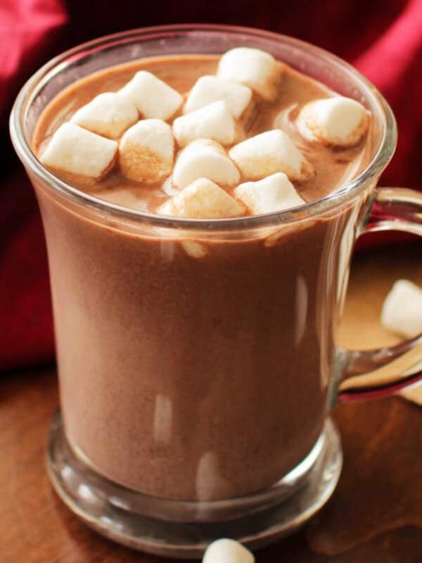 a mug of rich, creamy hot chocolate topped with soft marshmallows.