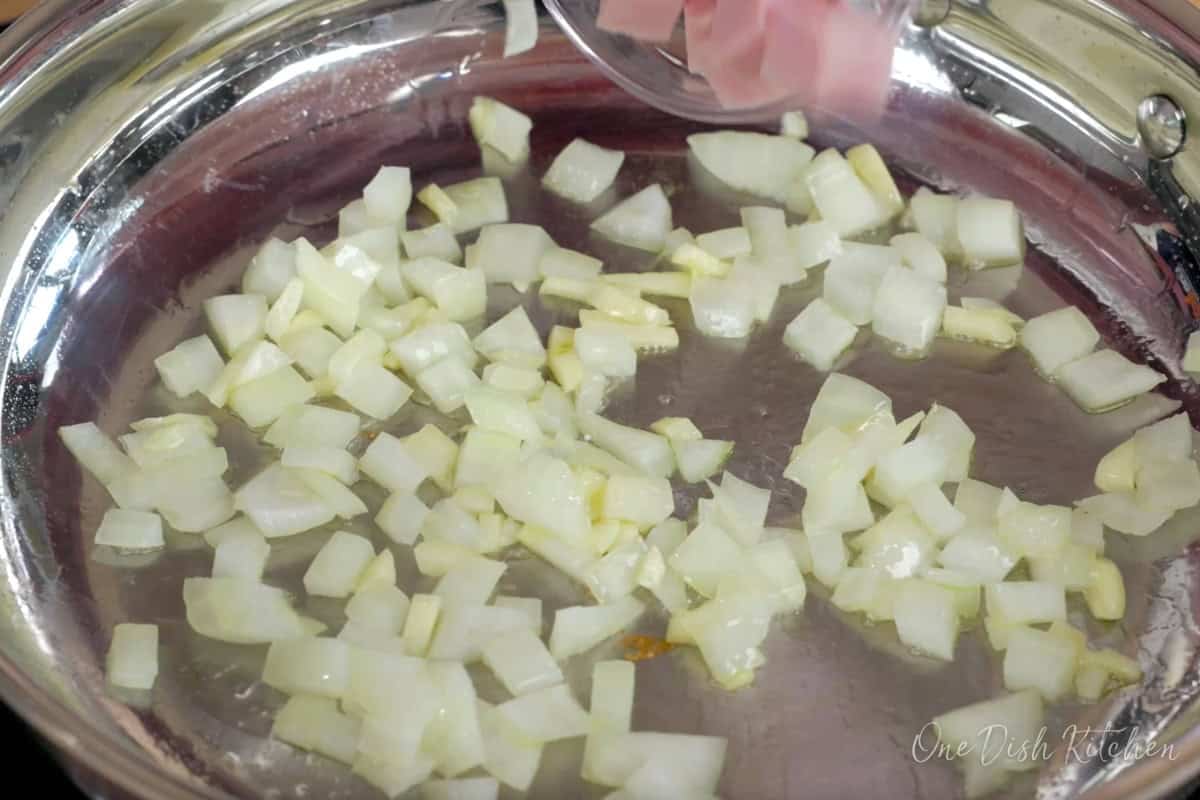 chopped onions and garlic in a skillet.