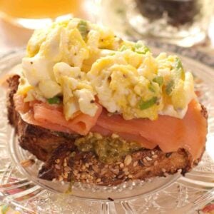 smoked salmon and scrambled eggs over a piece of crusty french bread.