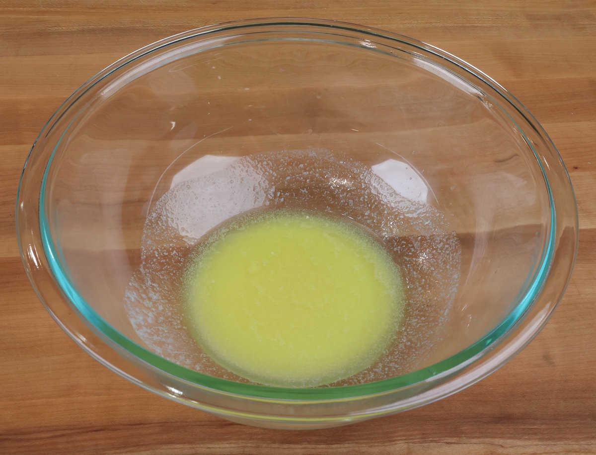 melted butter in a mixing bowl.