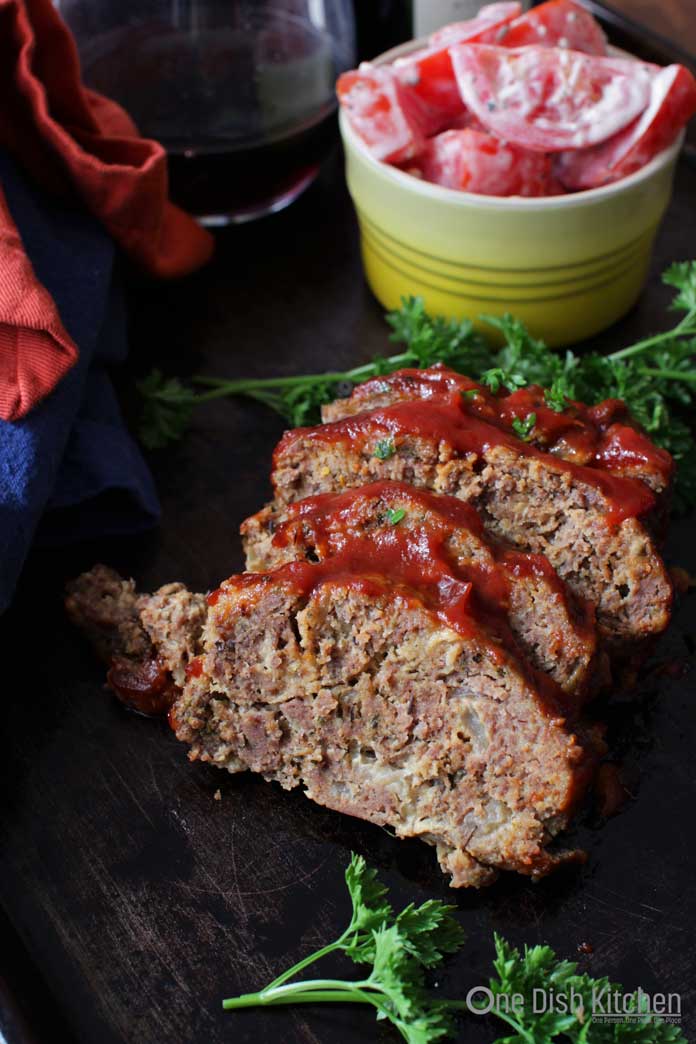 meatloaf made in a crockpot on a plate | one dish kitchen