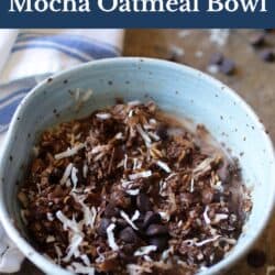an oatmeal bowl filled with chocolate chips and coconut.