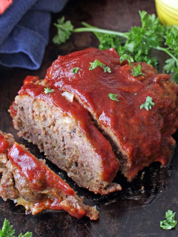 mini meatloaf with red sauce on top sliced.