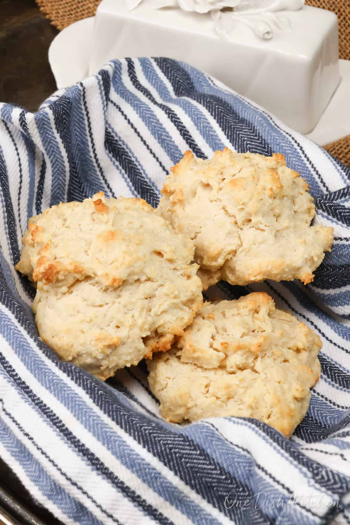 three drop biscuits in a bread basket.