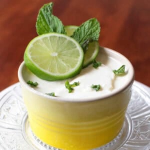 a lime posset for one person in a small ramekin.