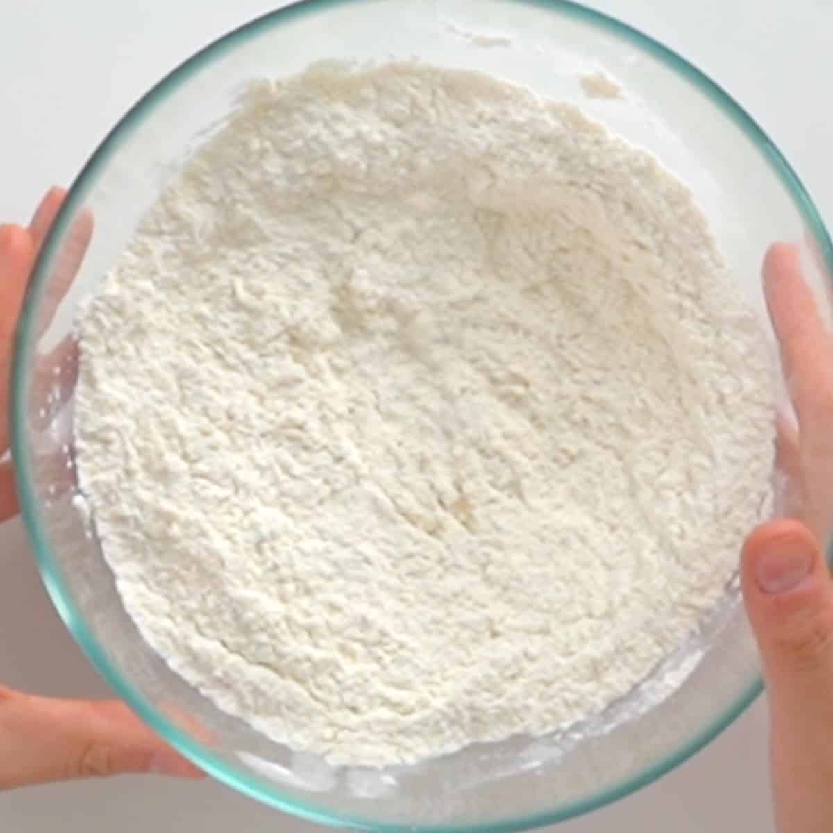 flour, baking powder, and sugar in a mixing bowl.