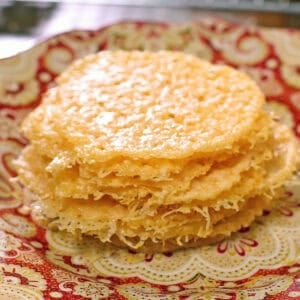 a small batch of parmesan crisps on a plate.