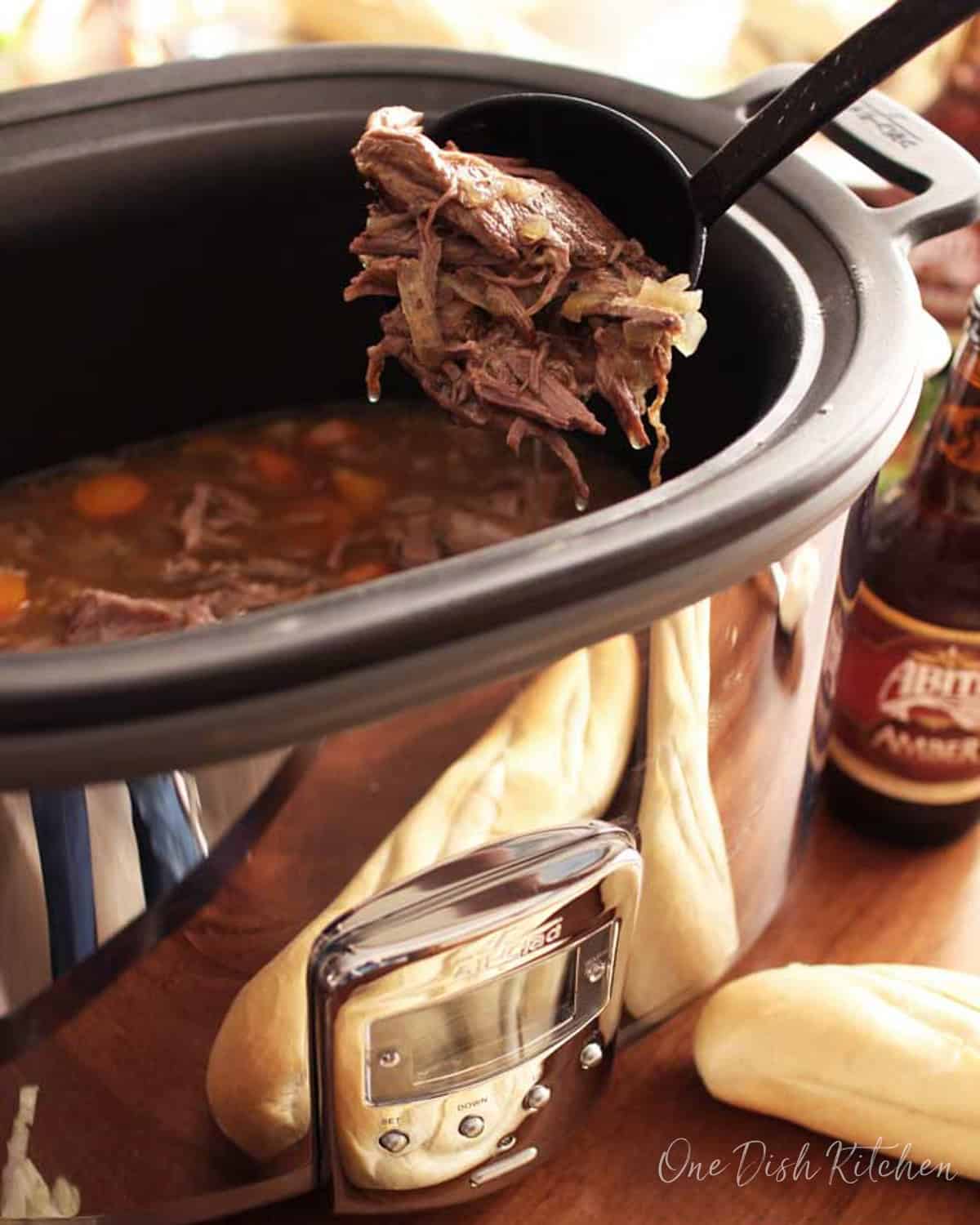 a pot roast in a large slow cooker.