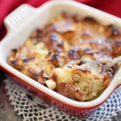 a breakfast casserole made with cubed bread in a small baking dish.