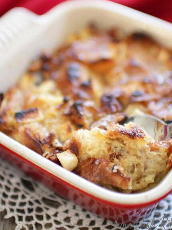 a breakfast casserole made with cubed bread in a small baking dish.