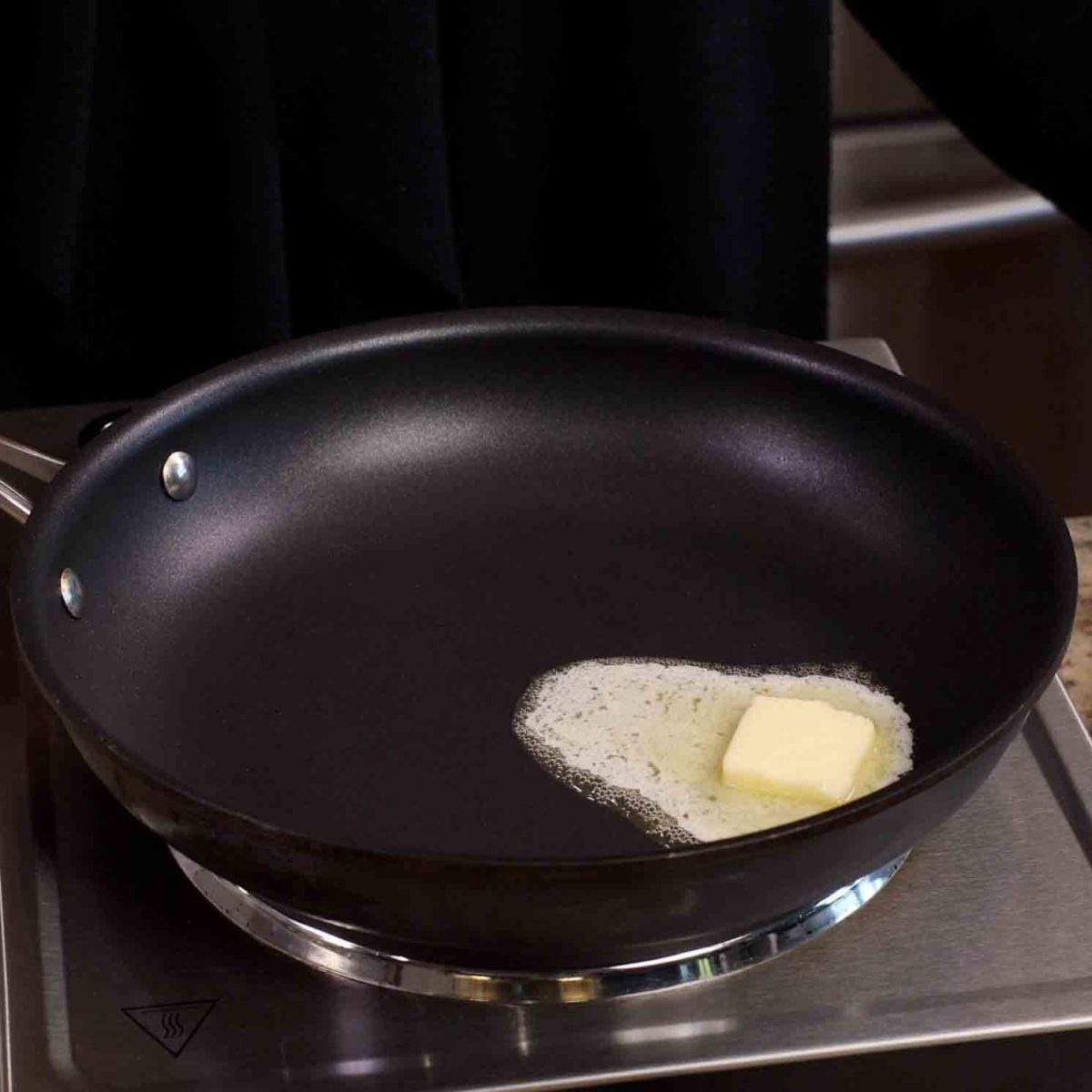 butter melting in a saucepan.