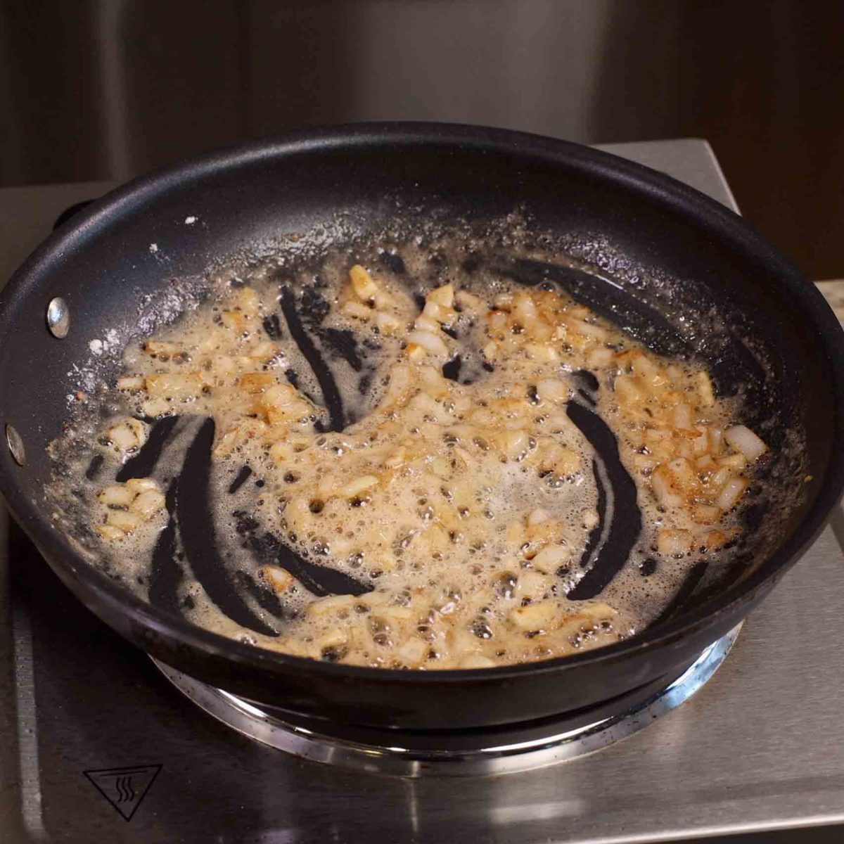 onions, butter, and flour cooking in a skillet.