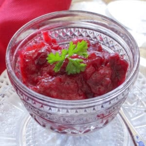 a small batch of cranberry sauce in a clear dish.