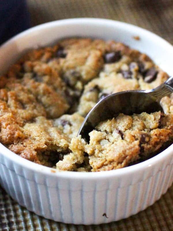 a single serve chocolate chip cookie in a deep dish.
