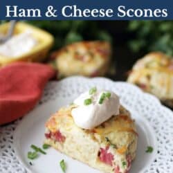 one scone filled with ham and cheese topped with cream.