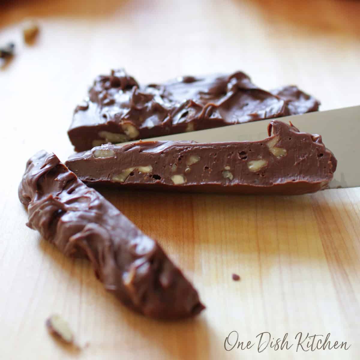 a small batch of chocolate fudge cut into squares.