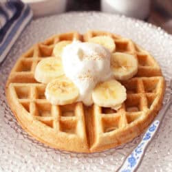 a single waffle on a plate.