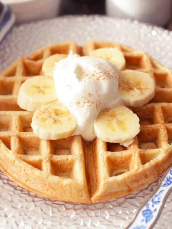 a single waffle on a plate.