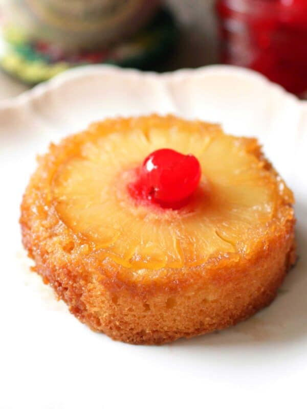 pineapple upside down cake on plate.