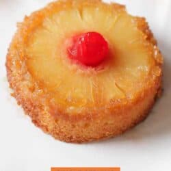 a pineapple upside down cake on a white plate.