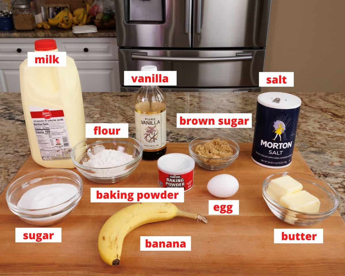 ingredients in caramelized banana upside down cake on a wooden cutting board in a kitchen.