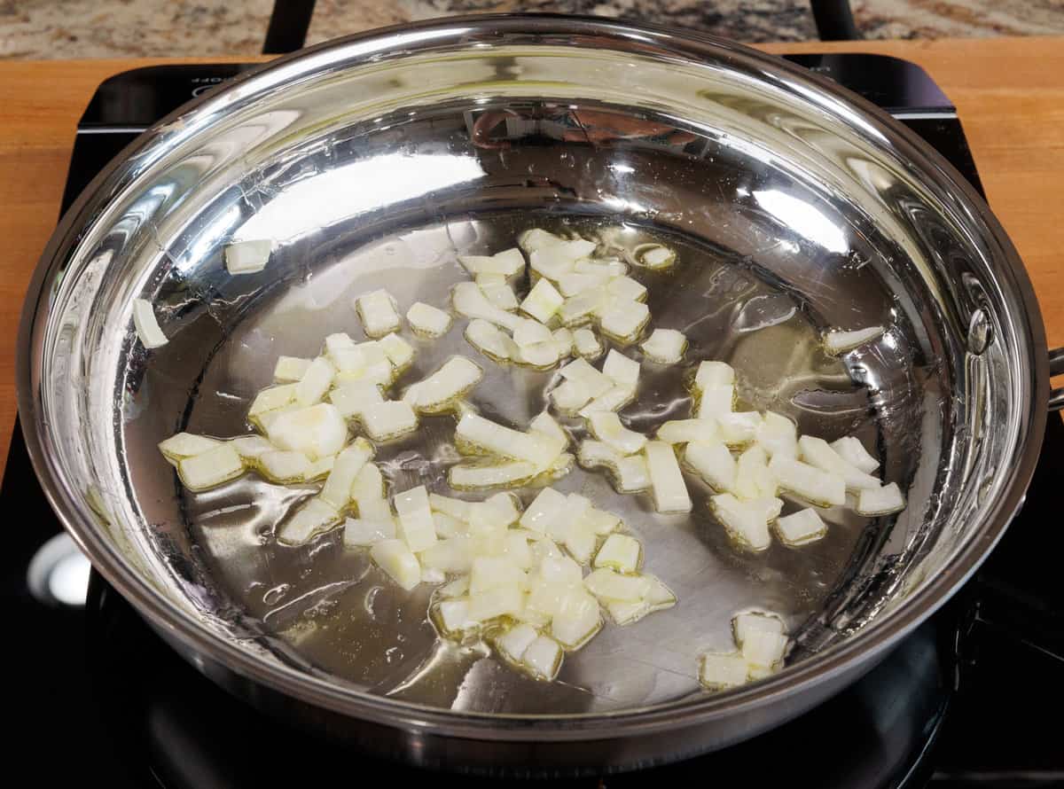 chopped onions softening in a skillet