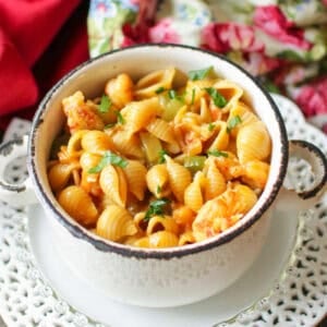 a single serving of crawfish pasta in a bowl.