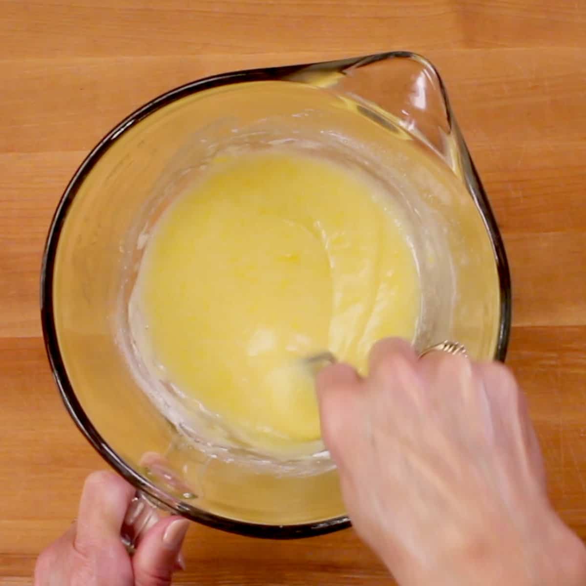 lemon bar filling in a mixing bowl.