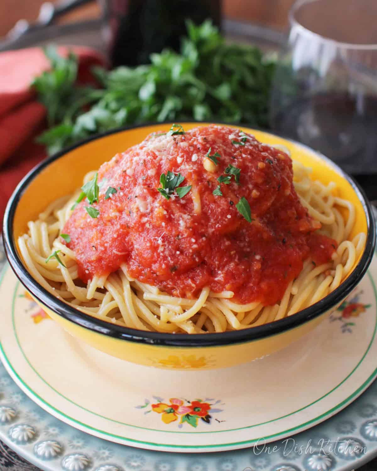 homemade pomodoro sauce over a bowl of pasta.