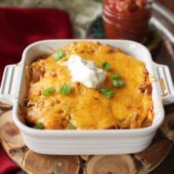 baking dish with vegetarian echiladas covered in cheese