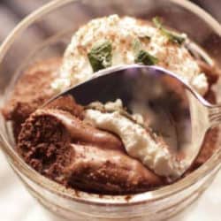 a chocolate mousse in a clear dessert dish.