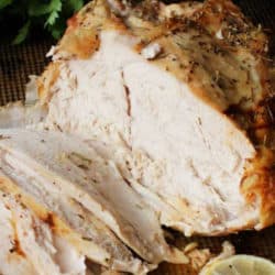 a partially sliced turkey roast