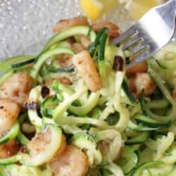 zucchini noodles with shrimp on a plate